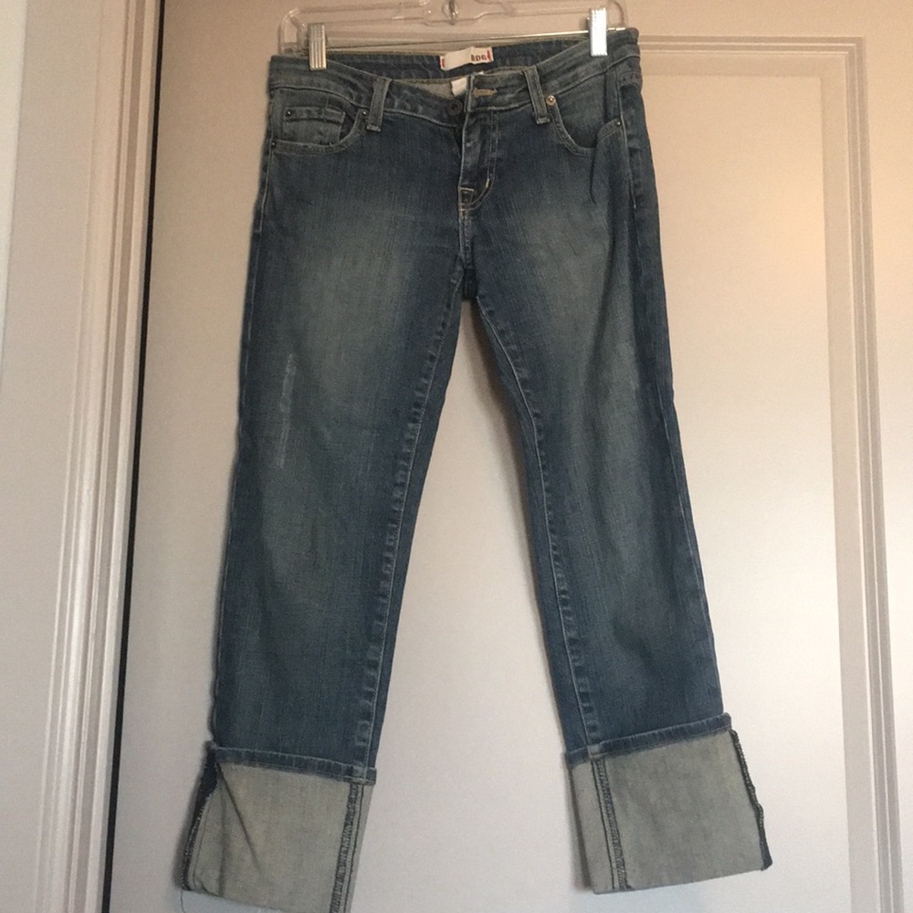 Medium wash Capri length jeans with cuffed bottom